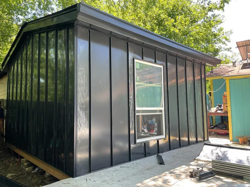 Black standing seam metal wall panels for Metal Roof Installation in Spring Lake Park