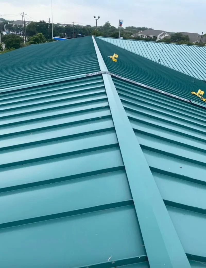 Green commercial metal roof ridge and valley for Metal Roof Repair in Spring Lake Park