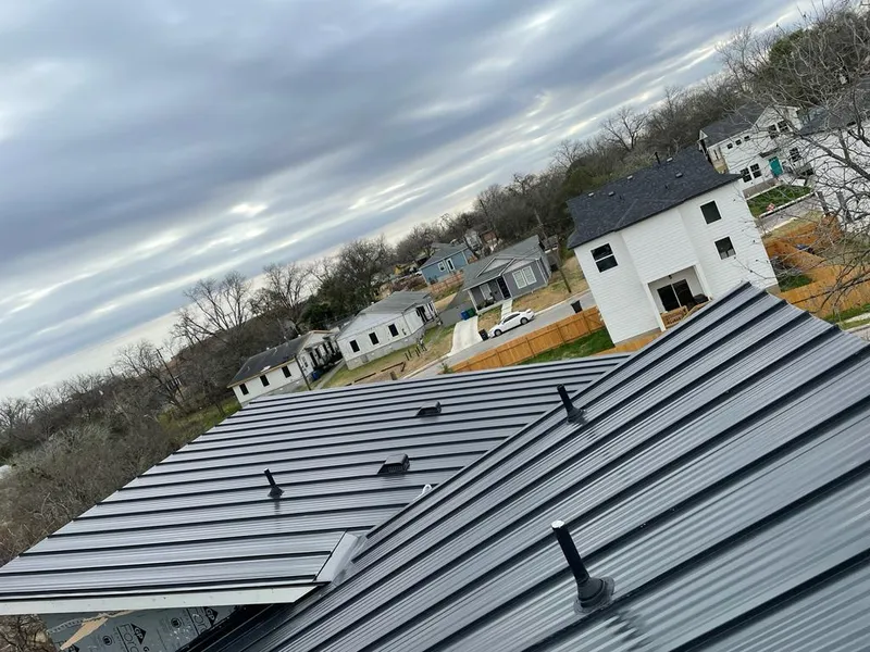 Standing seam metal roof panels with vents for Skylight Repair in Spring Lake Park
